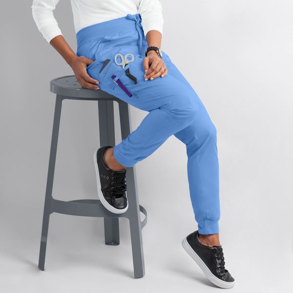 The Loop's Essential Role: Unraveling the Purpose Behind Scrub Pants Design